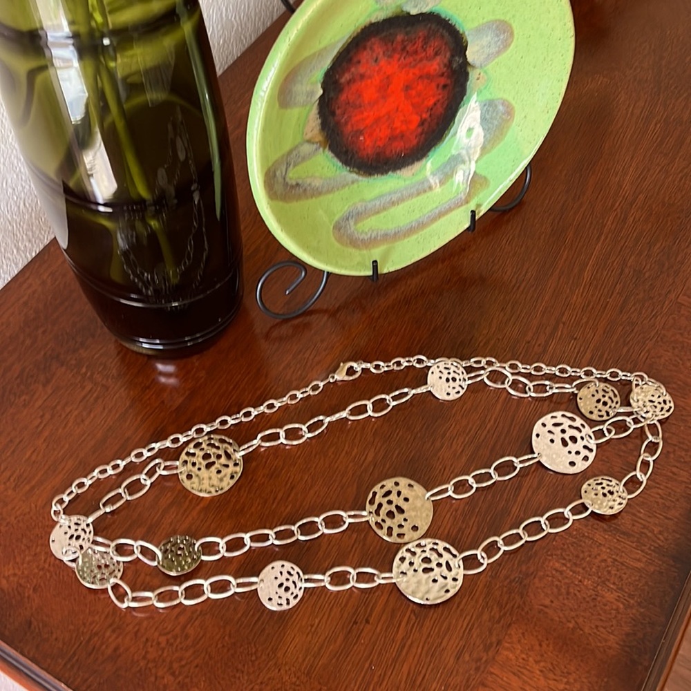 Double strand silver necklace with round silver and gold sand dollars
